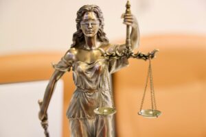 Detailed image of Lady Justice statue, symbolizing fairness and impartiality.