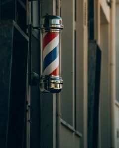 Traditional barber pole in Proença-a-Nova. Symbol of barbershop heritage.